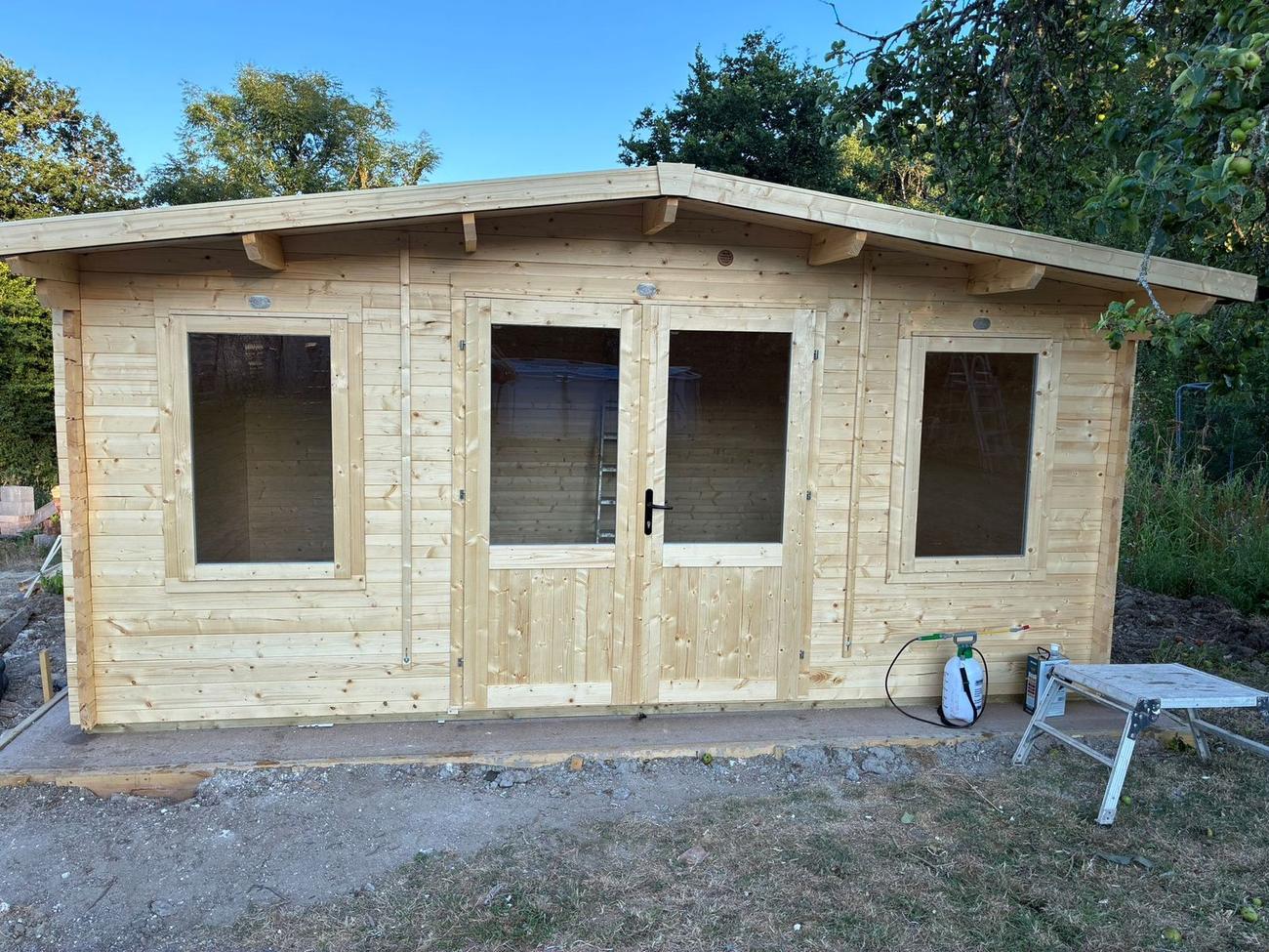 Timber garden room built on a new concrete base in West Dorset