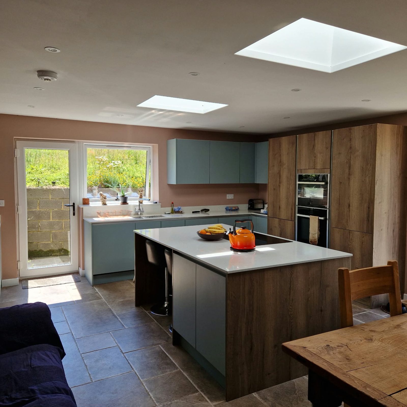 Kitchen with island and rooflight, West Dorset